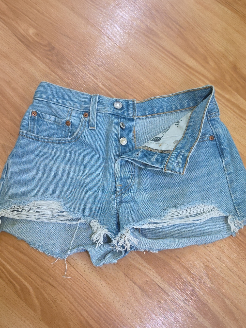 Levi's 501 Light Blue Distressed Jean Shorts
